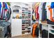 Well-organized walk-in closet featuring custom shelves and rods for ample clothing storage at 3252 Toscana Dr, St Cloud, FL 34772