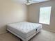 Bright bedroom with a ceiling fan and a window at 3561 Sanctuary Dr, St Cloud, FL 34769