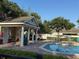Community pool features comfortable seating and shaded areas, perfect for relaxation and enjoyment at 3561 Sanctuary Dr, St Cloud, FL 34769