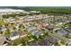This aerial view showcases a desirable neighborhood with neatly arranged homes and green spaces at 4007 Green Sabal Dr, Orlando, FL 32824