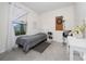 Cozy bedroom with a twin bed, bright window, and playful accents, ideal for a or guest room at 4007 Green Sabal Dr, Orlando, FL 32824