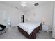 Inviting bedroom featuring neutral walls, tile flooring, and ample natural light at 4007 Green Sabal Dr, Orlando, FL 32824
