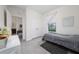 Comfortable bedroom showcasing a twin bed, closet, and window, with access to an adjacent space at 4007 Green Sabal Dr, Orlando, FL 32824