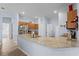 Kitchen featuring granite countertops, stainless steel appliances, and tile flooring at 4125 Navigator Way, Kissimmee, FL 34746