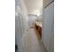 Narrow bathroom featuring a tiled floor, shower, and double sink vanity at 4525 Sw 52Nd Cir # 103, Ocala, FL 34474