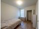 Comfortable bedroom featuring hard wood floors, large window, neutral colors and lots of closet space at 4525 Sw 52Nd Cir # 103, Ocala, FL 34474