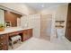 Spacious bathroom features a walk-in shower and large vanity with ample counter space at 4561 Henry J Ave, St Cloud, FL 34772