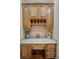 Functional built-in desk area offering ample storage and countertop space with custom cabinetry at 4561 Henry J Ave, St Cloud, FL 34772