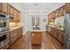Spacious kitchen with a center island cooktop and stainless steel appliances at 4561 Henry J Ave, St Cloud, FL 34772