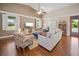 Cozy living room with comfortable seating, hardwood floors, and lots of natural light at 4561 Henry J Ave, St Cloud, FL 34772