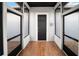 Enclosed porch with stylish flooring and screened windows on all sides at 4561 Henry J Ave, St Cloud, FL 34772