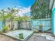 Backyard deck offers a serene outdoor space, surrounded by lush plants and decorative elements at 4765 Lake Shore Dr, St Cloud, FL 34772