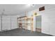 Spacious garage featuring ample storage space and a convenient entrance to the main living area at 503 New York Ave, St Cloud, FL 34769