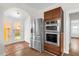 The kitchen has stainless steel appliances at 503 New York Ave, St Cloud, FL 34769