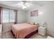 Cozy bedroom with neutral colors and a comfortable bed at 5123 Lighthouse Rd, Orlando, FL 32808