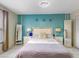 Bright primary bedroom with a comfortable bed, and natural light from the window at 5123 Lighthouse Rd, Orlando, FL 32808