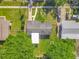 Aerial view of the home showcasing its roof and surrounding greenery at 514 S Cottage Hill Rd, Orlando, FL 32805