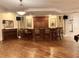 Elegant bar area with seating, wooden cabinetry, and recessed lighting, great for entertaining guests at 5550 E Michigan St # 2214, Orlando, FL 32822