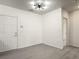 Cozy living room features modern lighting and durable flooring at 5550 E Michigan St # 2214, Orlando, FL 32822