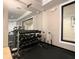 Modern weight room with a full set of dumbbells and mirrors for tracking progress in your fitness journey at 5550 E Michigan St # 2214, Orlando, FL 32822
