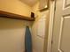 This closet features a clothing bar and some utilities access at 7658 Whisper Way # 203, Reunion, FL 34747