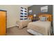 Charming bedroom with twin beds, nautical-themed decor, and bright blue accents at 7719 Comrow St, Kissimmee, FL 34747