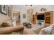 Inviting living room featuring neutral tones, comfortable seating, and stylish decor at 7719 Comrow St, Kissimmee, FL 34747