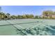 Well-maintained community tennis courts under a clear blue sky at 7719 Comrow St, Kissimmee, FL 34747