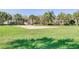 Community sand volleyball court with nearby picnic area on a sunny day at 7719 Comrow St, Kissimmee, FL 34747