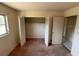 Standard bedroom with a closet and a window for natural light at 8 Emerald Way, Ocala, FL 34472