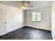 Bright bedroom with neutral walls, stylish flooring, and a window for natural light at 832 Whalebone Bay Dr, Kissimmee, FL 34741