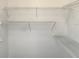 Walk-in closet with wire shelving, offering an organized storage solution at 832 Whalebone Bay Dr, Kissimmee, FL 34741