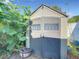 Durable outdoor shed with wide double door for secure and convenient storage at 832 Whalebone Bay Dr, Kissimmee, FL 34741
