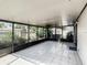 Spacious screened porch with tiled floor offering great outdoor view at 832 Whalebone Bay Dr, Kissimmee, FL 34741