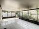 Large screened porch with tiled floor providing an inviting outdoor space at 832 Whalebone Bay Dr, Kissimmee, FL 34741