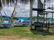 View of the activity park with trampolines and climbing walls for active fun at 8338 Modiano St, Orlando, FL 32827