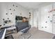Bedroom with dinosaur stickers and desk space at 8338 Modiano St, Orlando, FL 32827