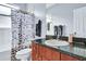 Bathroom with a shower-tub combo and vanity at 932 Emerald Green Ct, Kissimmee, FL 34746