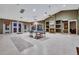 Spacious clubhouse featuring tile floors, fireplace, ping pong table, and access to the fitness center at 932 Emerald Green Ct, Kissimmee, FL 34746