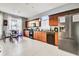 Functional kitchen features modern appliances, ample cabinetry, and adjacent breakfast area, great for meal prep at 932 Emerald Green Ct, Kissimmee, FL 34746