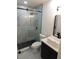 Bathroom featuring a glass shower door, and modern fixtures and finishes at 527 Stillwater Dr, Oviedo, FL 32765