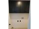 Laundry room features upper cabinets, electrical outlets and neutral color palette at 527 Stillwater Dr, Oviedo, FL 32765