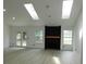 Bright living room with skylights, fireplace, and lots of natural light at 527 Stillwater Dr, Oviedo, FL 32765