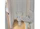Small bathroom with white toilet, sink, tile floors and no frills for functionality at 10330 Turkey Lake Rd # A-4 Ak/A 107, Orlando, FL 32819