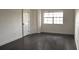Spacious bedroom with closet, door and large multi-pane window to view the outdoor scenery at 10330 Turkey Lake Rd # A-4 Ak/A 107, Orlando, FL 32819
