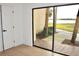 View of the pool outside sliding glass doors with tiled floors and neutral paint at 10330 Turkey Lake Rd # A-4 Ak/A 107, Orlando, FL 32819