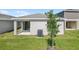A view of the backyard and home at 6385 Clover St, Lake Hamilton, FL 33851