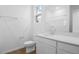 White bathroom with white counter and a toilet at 6385 Clover St, Lake Hamilton, FL 33851