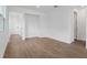 Bright living room with tile flooring and ample space for entertaining guests at 6385 Clover St, Lake Hamilton, FL 33851
