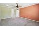 Bright bedroom with neutral carpeting and large windows providing natural light at 789 Cielo Trl, Kissimmee, FL 34759